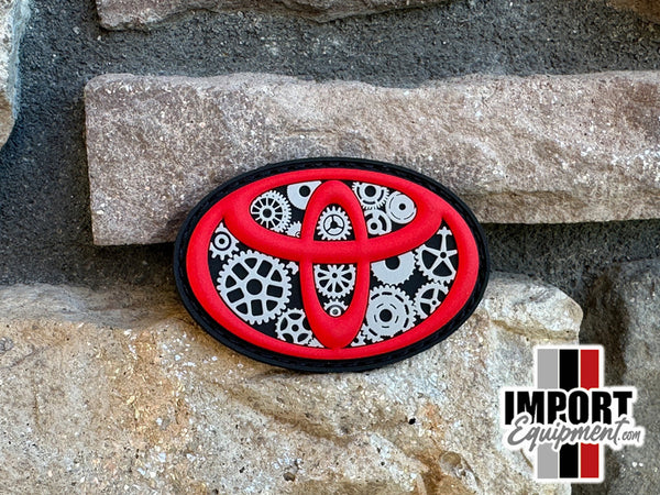 Symbol with Gears - PVC Patch (Red Symbol)